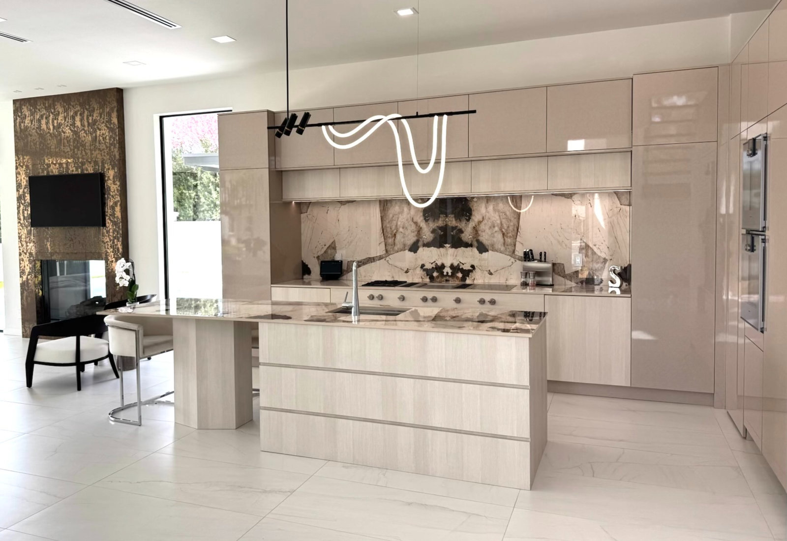 Modern minimalist kitchen with statement lighting