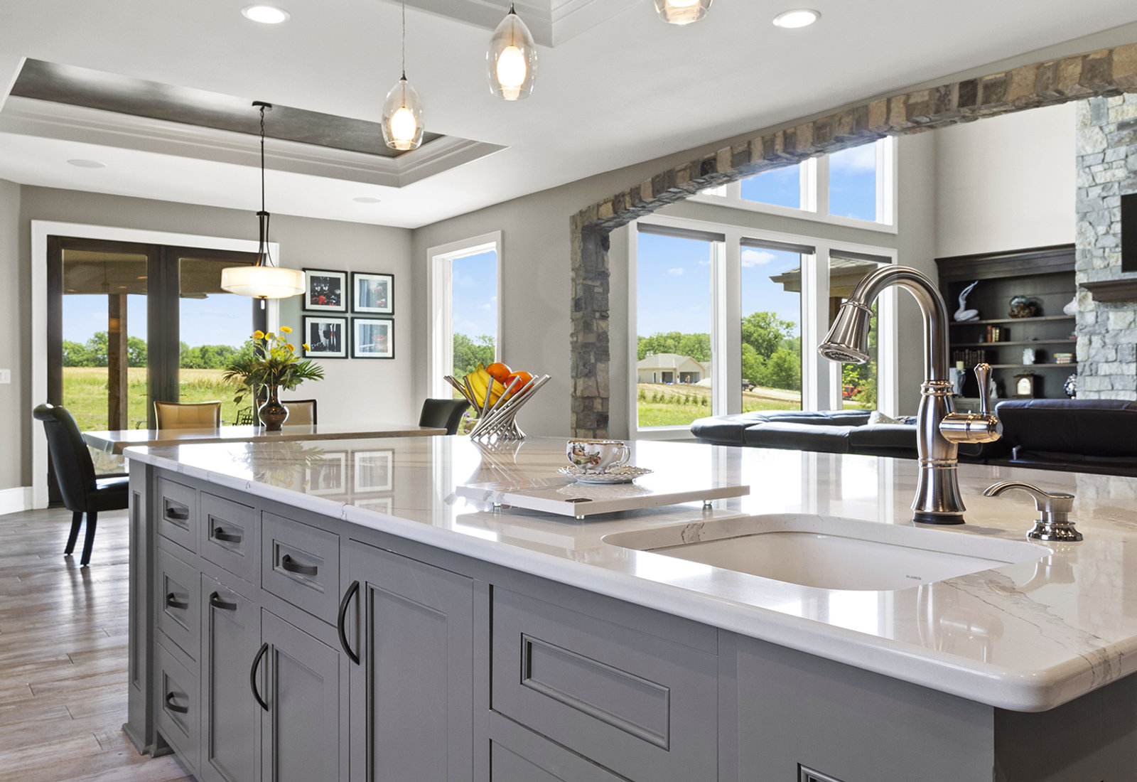 Open kitchen with stone arch and natural light